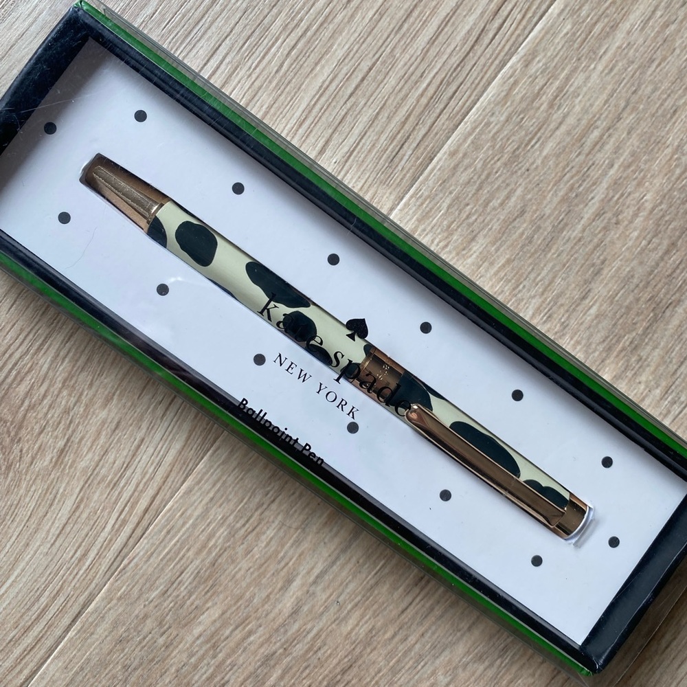 kate spade New York ballpoint pen in the forest feline leopard print pattern